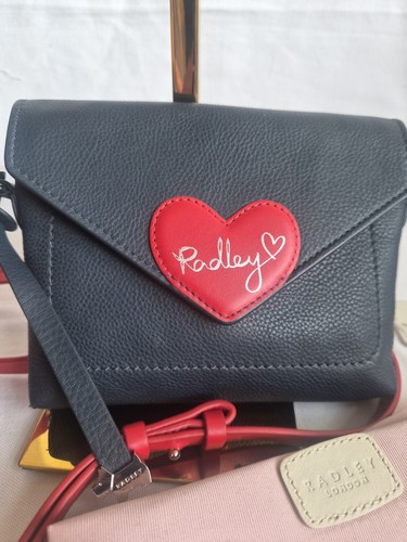 Brand new with defect radley - defect.,